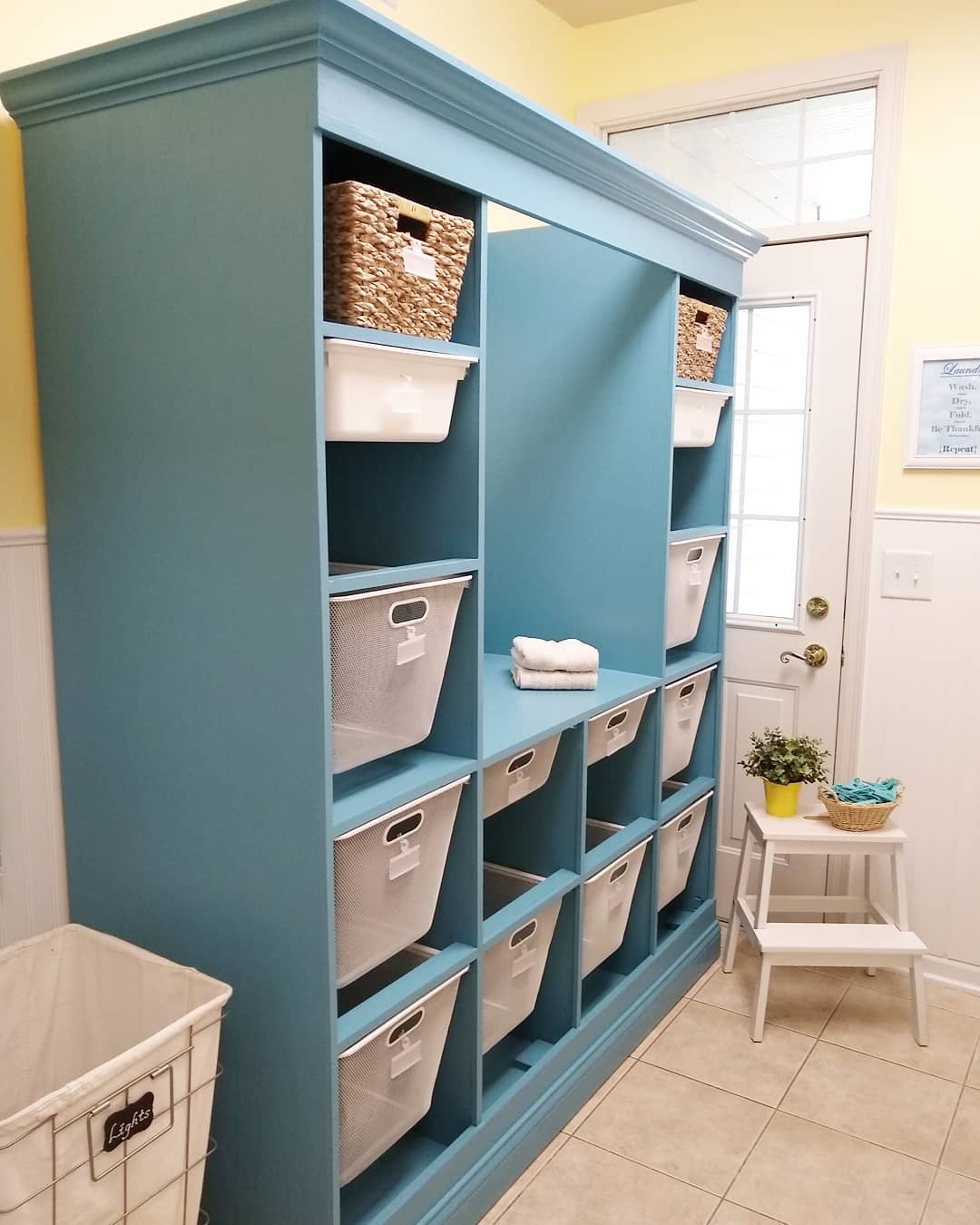 My laundry room got a lot more organized with the addition of this cabinet I built to hold all my Ik…