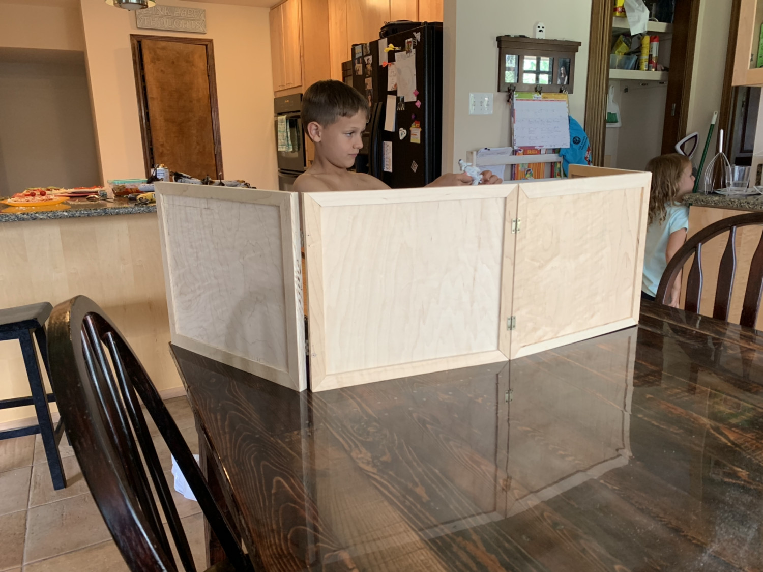 A DM screen I threw together with spare plywood. Might be too big. But my kids are excited to decorate it for me.