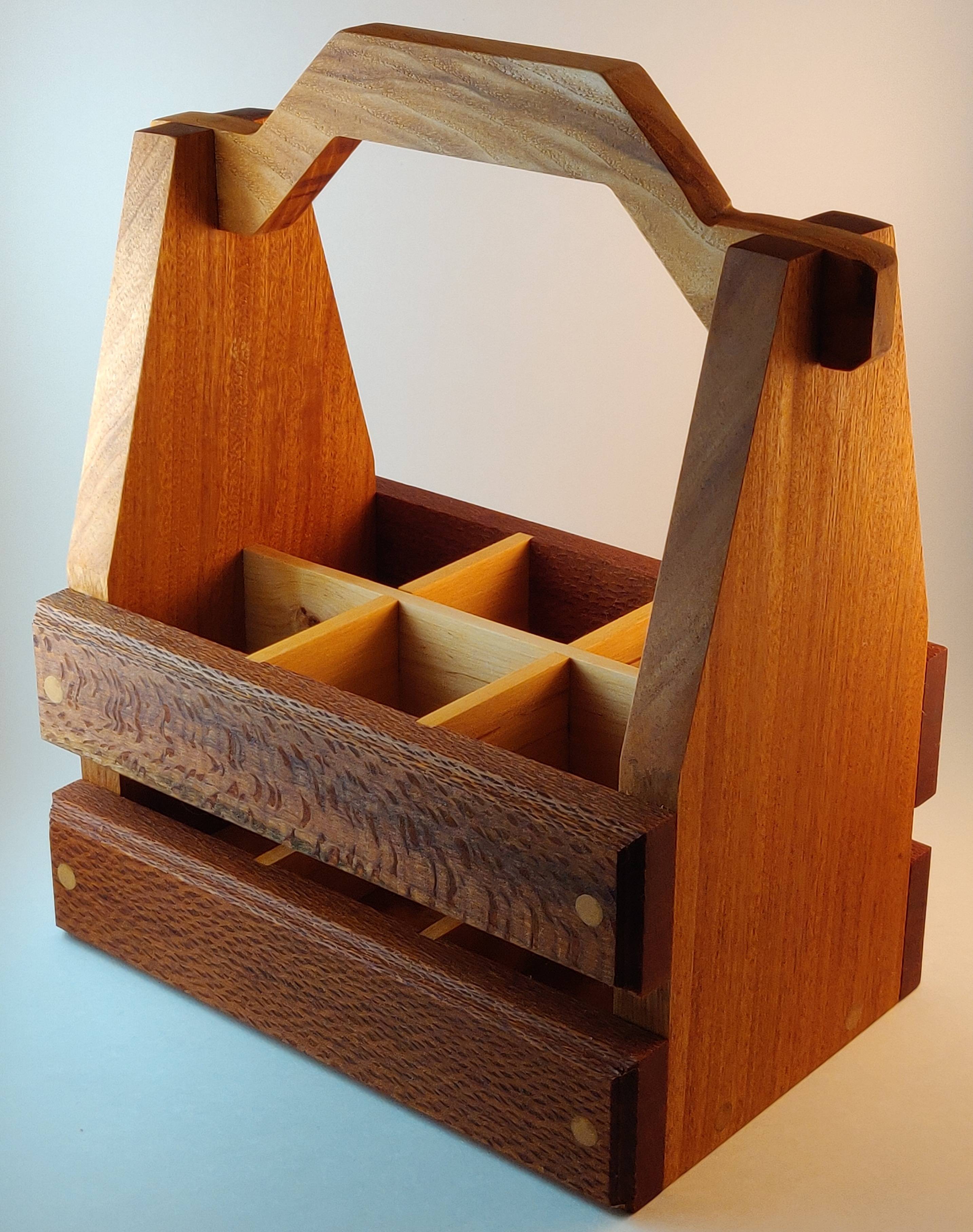 A beer caddy I made. Sapele, leopardwood, and hackberry.