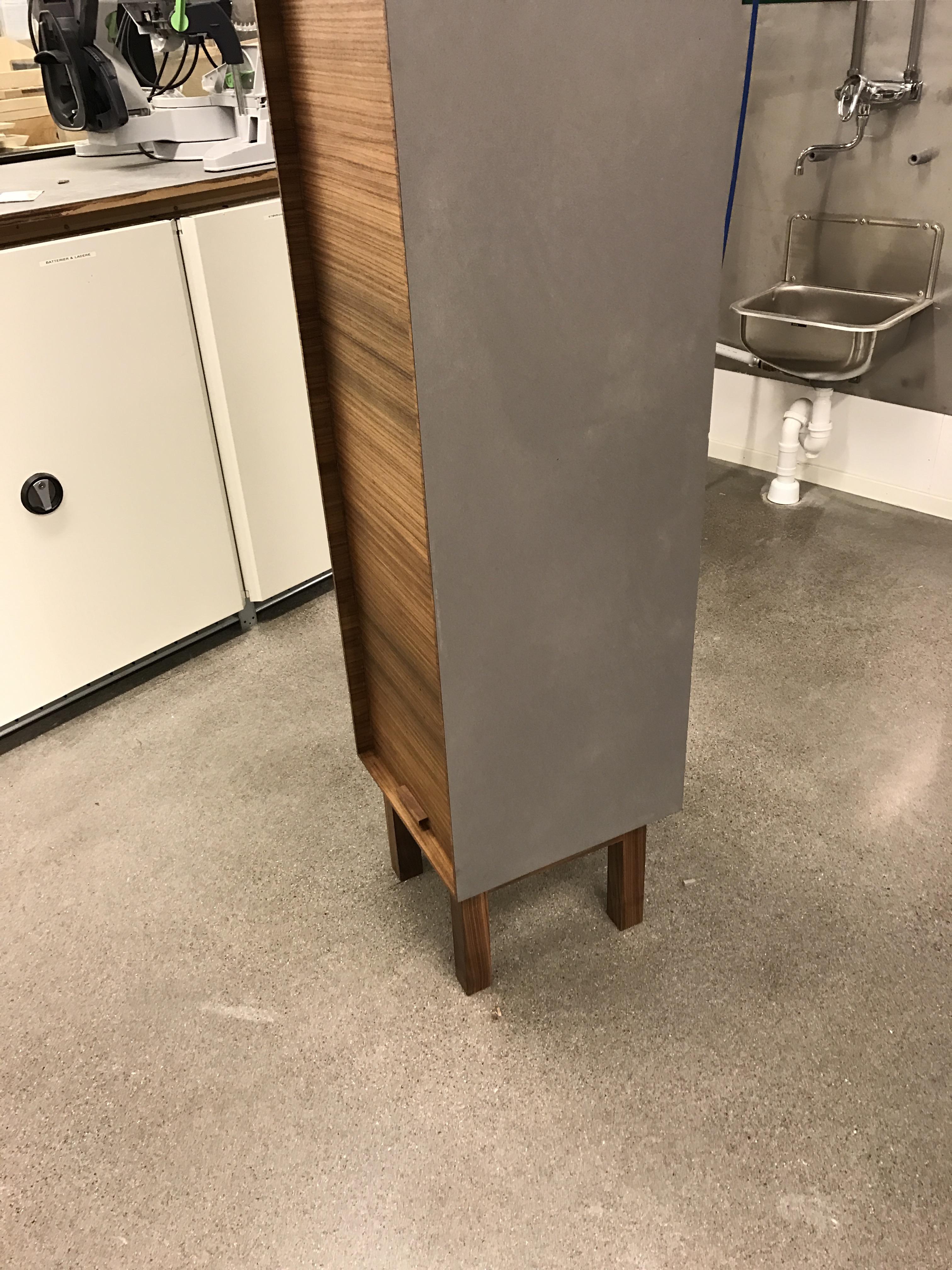 A drawer I made from Walnut veneer and valchromat. Its really tall, but only has one small drawer at the bottom as you can see. More or less piece of art rather than a functional piece of furniture. In my opinion just some eye-candy.