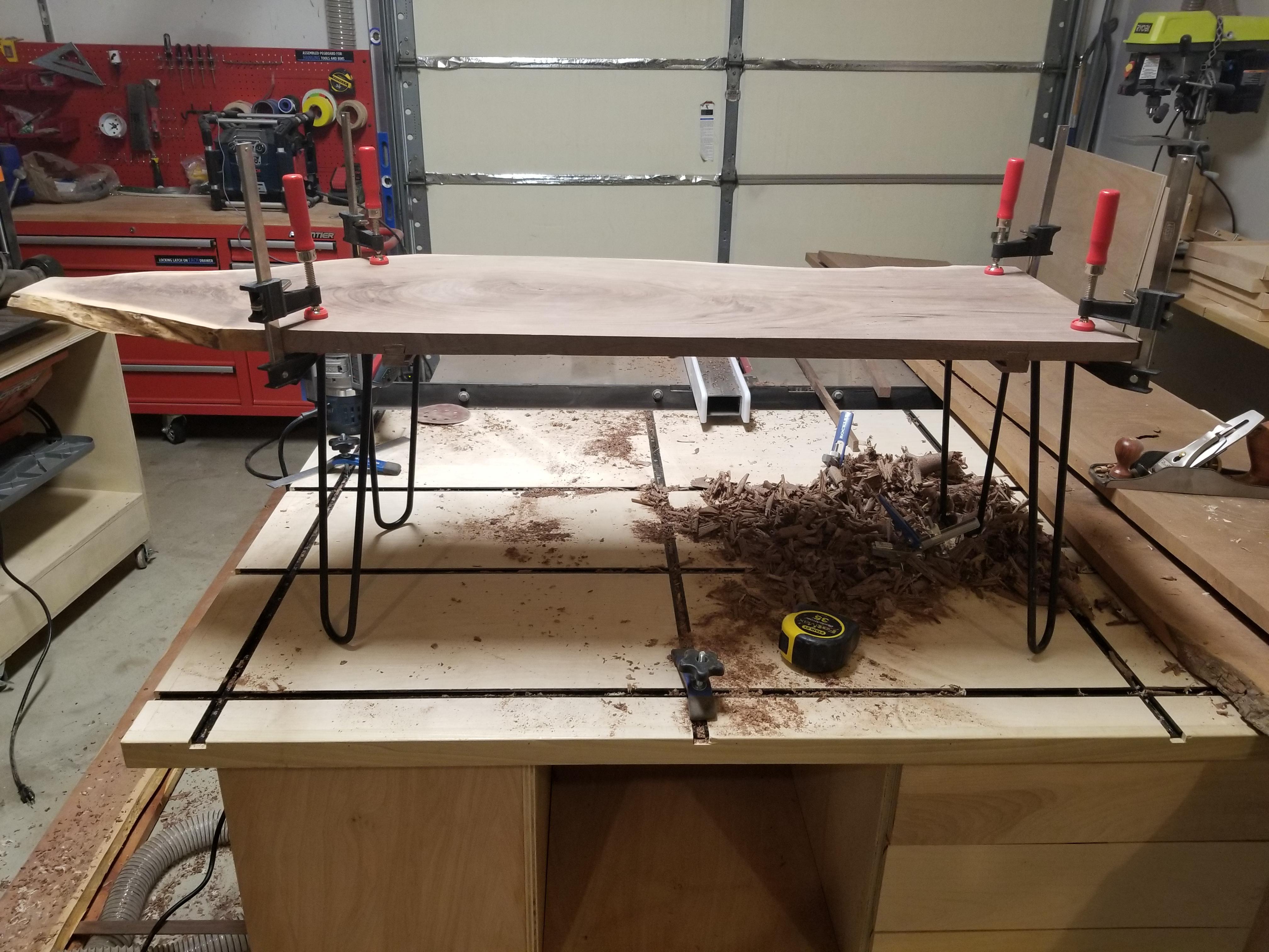 Dovetail drawer slides for both drawers front and back roughed in and glued. Now test fitting the hairpin legs. About 18th of an inch wobble from back left corner to the front right corner, which I need to fix.