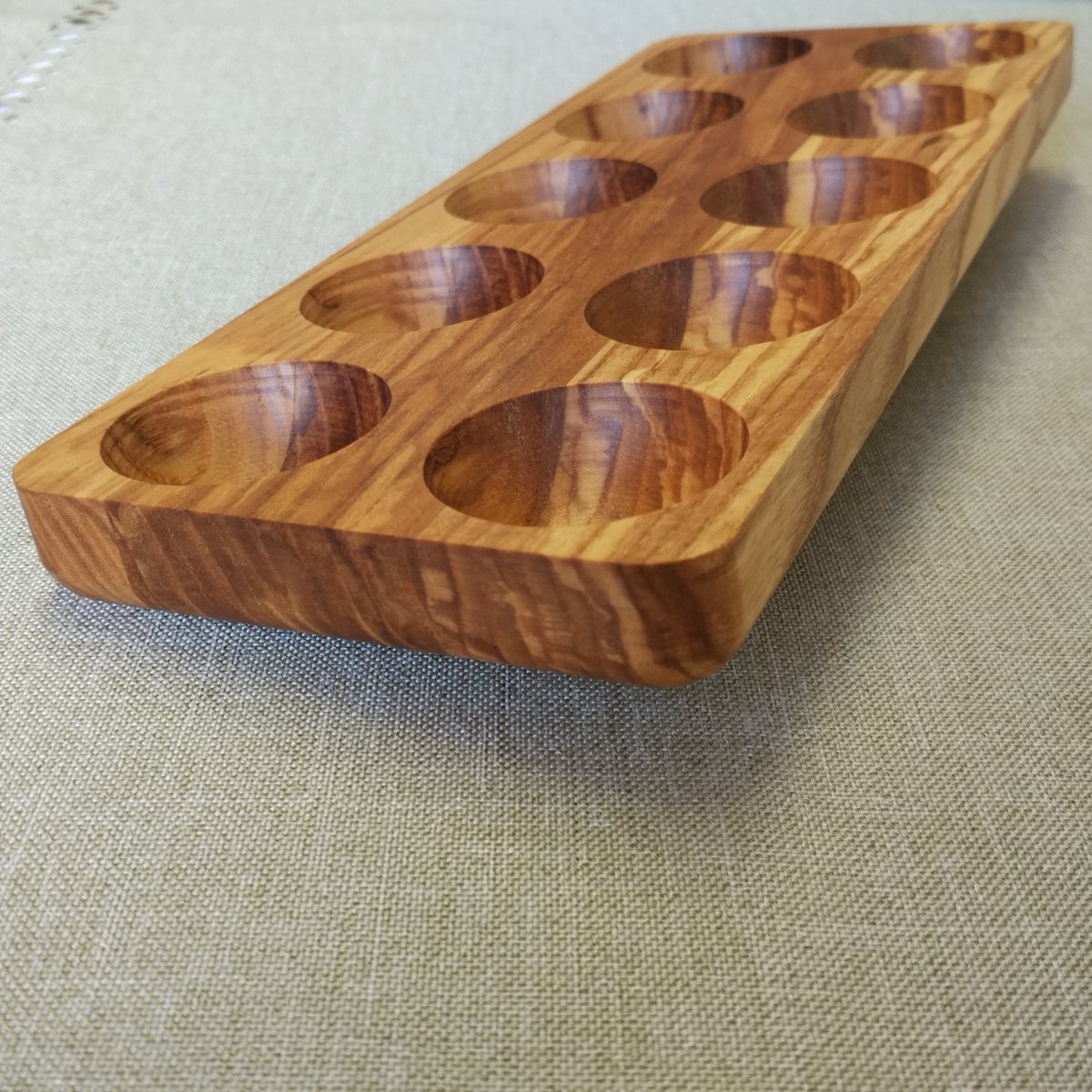 Eggholder made from ash wood. Natural beeswax finish.For 10 eggs. If you value natural materials and handmade, it is a perfect choice. via Woodeggtray Eggstorage gift giftideas souvenirs woodworking wooddesign tabledecor WoodEggTray